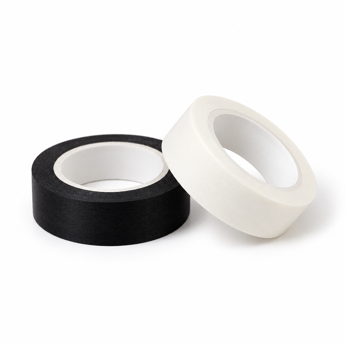 Black and white paper tape rolls on white