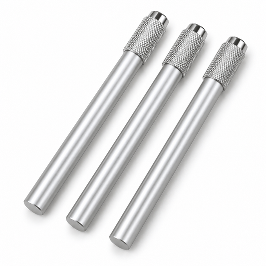 Three empty silver metal pencil extenders