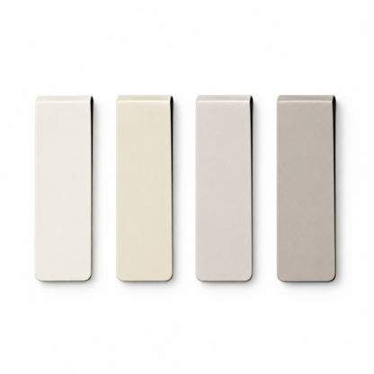 Four warm-neutral magnetic bookmarks on white